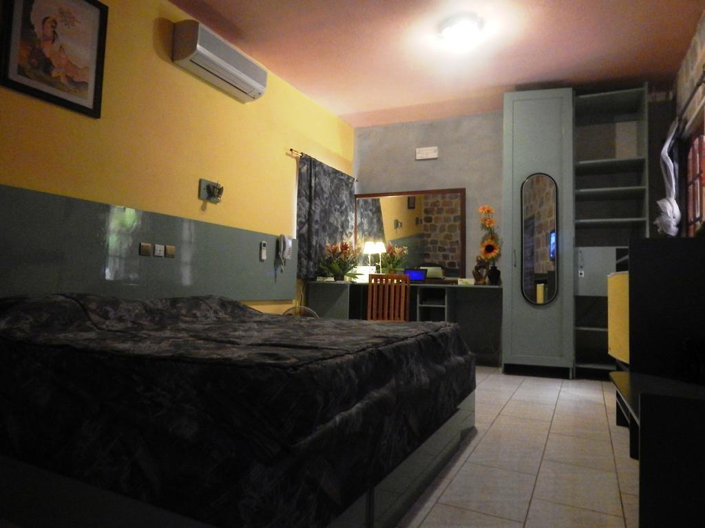 Résidence Hôtelière Océane Lomé Habitación foto